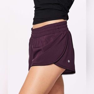 Dark purple, beat the heat, lululemon shorts.